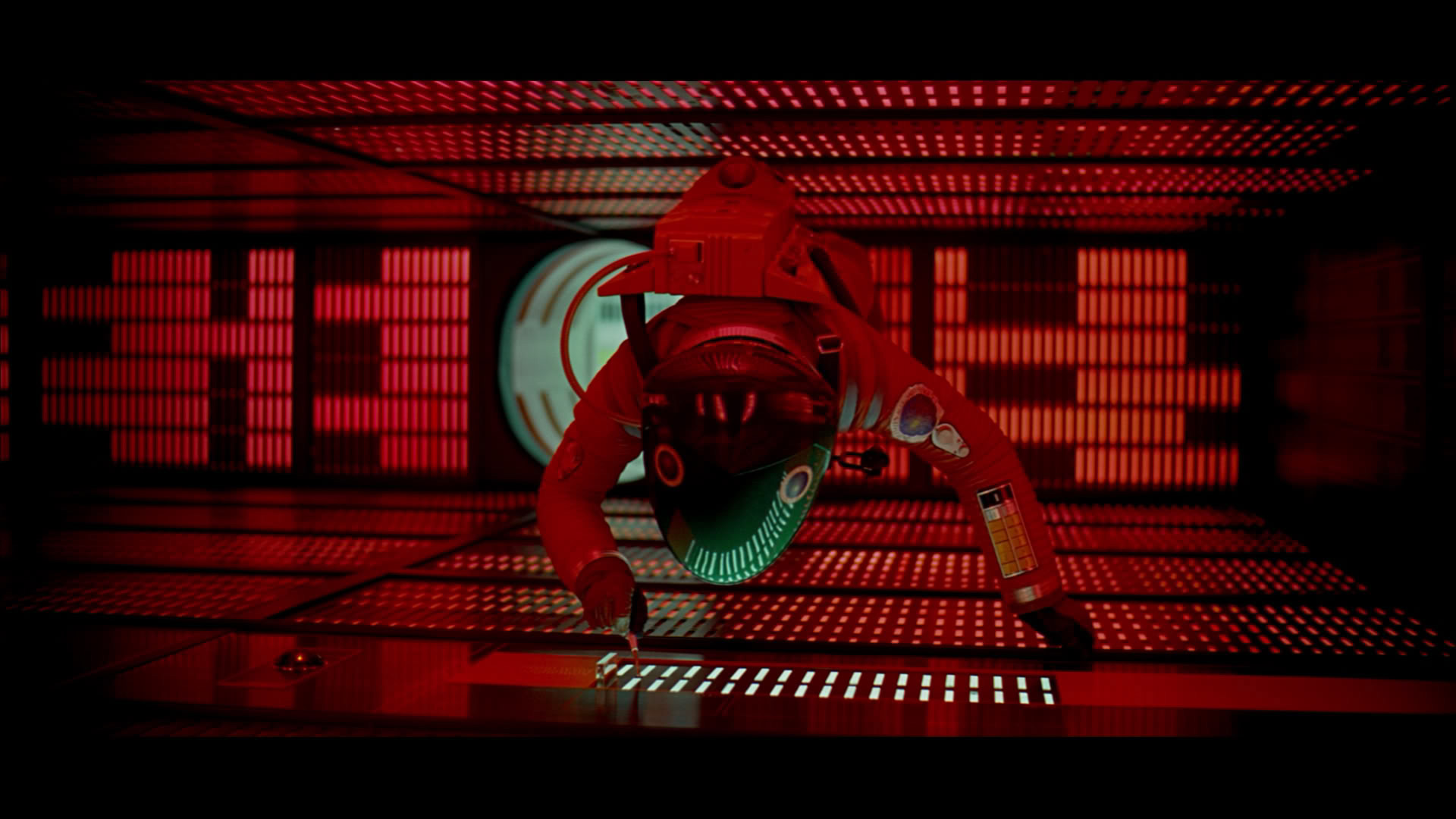 The meme is an image of a character from the movie "2001: A Space Odyssey" (specifically, David Bowman) in a situation that is humorous and ironic. The text "I'll get the wine" is written on the screen, implying that the character is in a situation where he's supposed to be getting wine, but he's actually in a space station where there is no wine.